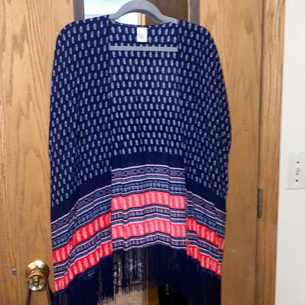 Kimono. Don’t remember the brand. Brand isn’t on kimono. Worn handful of times